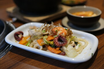 Sushi rice cheese Rice and prawns or paella, a meal with seafood and vegetables. Cooked rice with...