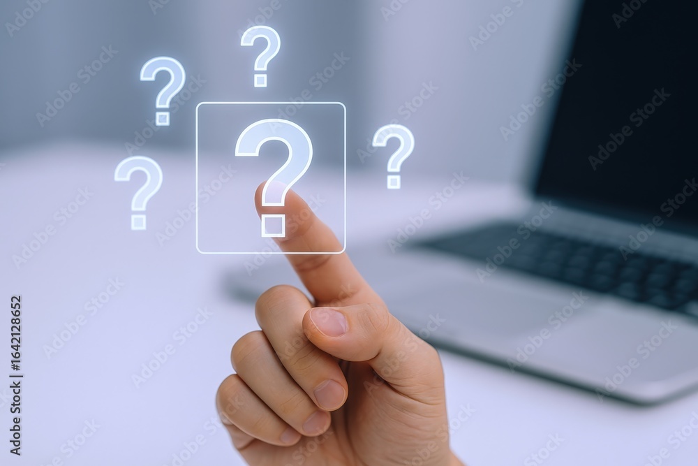 Poster interactive digital interface featuring a question mark pressed by a hand with laptop in background