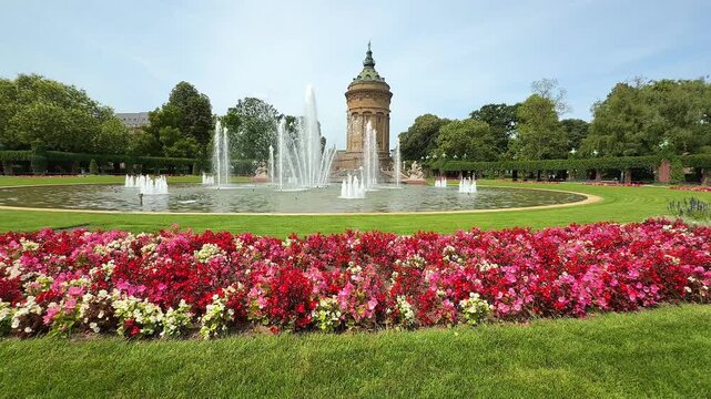 Water tower and fountains in Friedrichsplatz garden in Mannheim, Germany