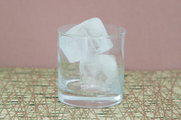 Empty glass with ice