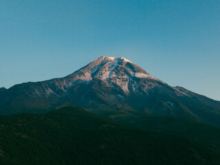 defaultPico de Orizaba at dawn with vibrant colors, highlighting the mountain’s majestic...