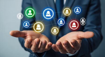 Fototapeta premium Global Networking Concept: Businessman Presenting a Virtual Network of Connected People Icons in his Hands