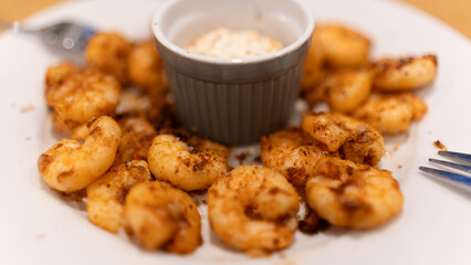 Golden fried garlic shrimp with aromatic herbs and creamy center sauce. Gourmet seafood dish perfect for restaurant menus, food blogs, and culinary photography