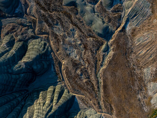 Top-down aerial view of unique erosion patterns and geological textures in Nallıhan, Turkey. The...