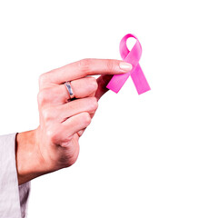 Woman’s hand holding a pink ribbon over a transparent background. Symbol of Breast Cancer...