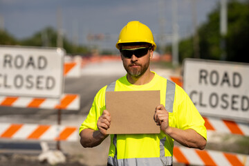 No trespassing. Construction worker with outstretched hand showing stop gesture warning. Stop sign...