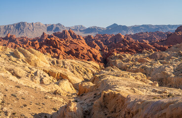Dramatic red sandstone formations known as Fire Canyon in Valley of Fire state park Nevada