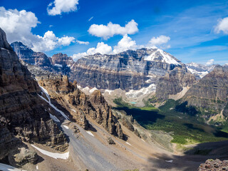 Rugged peaks and alpine valley from Mount Temple slopes in Banff