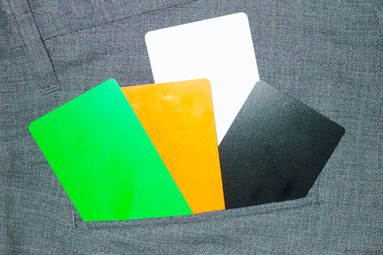 Credit debit payment money cards in pocket of formal trousers 