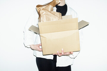 Person opening brown cardboard mail parcel package delivery boxes