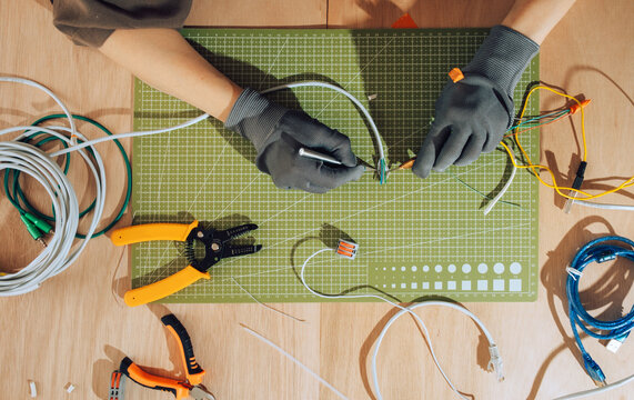 Qualified electrician connecting wiring