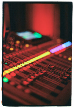 Audio Mixing Console in a Recording Studio at Night