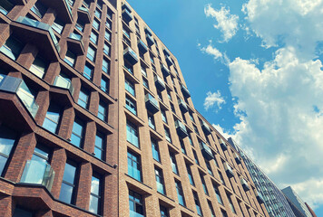 Architecture and real estate, modern residential apartment building with large panoramic windows
