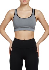 Woman wearing a gray and black sports bra and matching leggings.