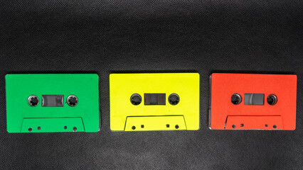 Colorful Retro Cassette Tapes on Black Background
