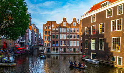 The Dancing Houses on a canal in Amsterdam, Netherlands