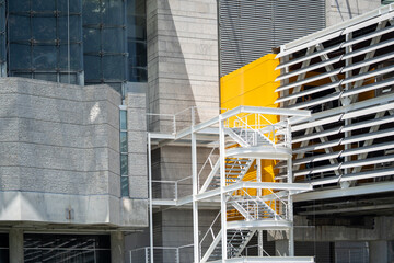 Modern Architecture With Spiral Staircase and Vibrant Color Accents