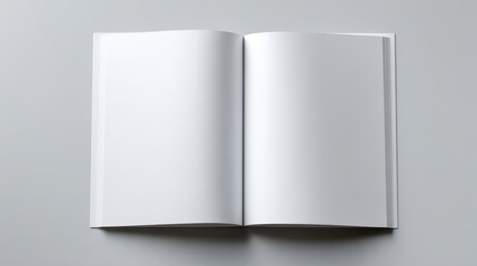 A 4K photo of blank white book mockup with a gray background, providing space for branding or design concepts.