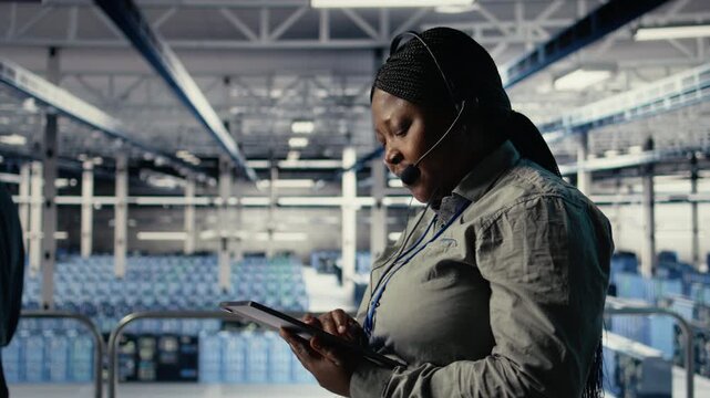 Data center colleagues using artificial intelligence to help customers resolve website hosting problems. Server room tech support coworkers help users keep internet services running smoothly, camera A