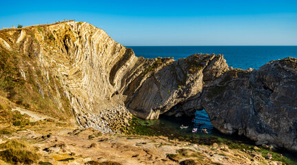 Stair Hole at Lulworth Cove in Dorset during golden hour
