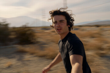 Running in the Desert While Capturing a Moment in Motion