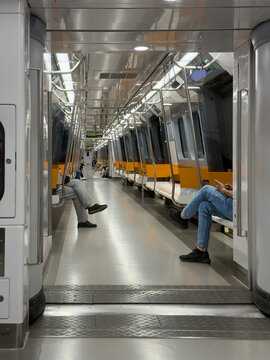 Modern Subway Car Interior With Seats and Safety Equipment Displayed
