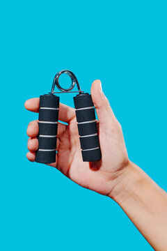 man about to use a hand gripper