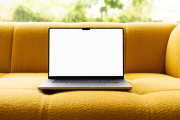 Mockup Laptop with Blank Screen on Yellow designer Sofa