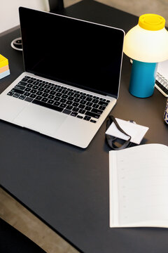 Work Desk with Laptop and Planner