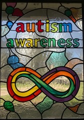 Obraz premium Stained glass autism awareness sign with infinity symbol in rainbow colors promoting neurodiversity inclusion mental health therapy and spectrum acceptance
