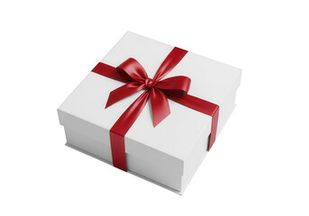 Fototapeta premium Elegant white gift box tied with a luxurious red satin ribbon and bow isolated on transparent background