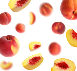 Fresh peaches whirling in air against white background