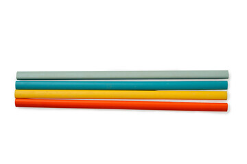 Row of unsharpened colorful wooden pencils isolated over a white background. Concept of stationery