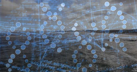 Fotobehang Zee & Oceaan Displaying digital DNA helix floating over sea at dusk, with nodes, grid lines and code text  © vectorfusionart