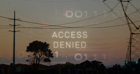 Displaying ACCESS DENIED overlay above suburban skyline at dusk, with utility poles and binary code