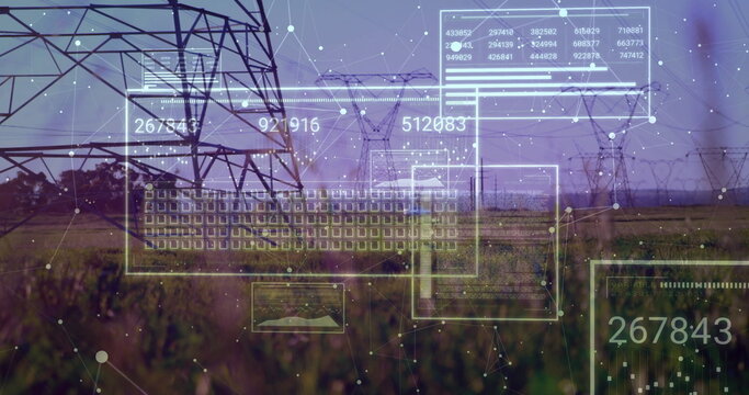 Naklejki Displaying steel lattice transmission tower standing in grassy field, with digital UI overlays