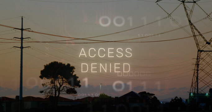 Displaying ACCESS DENIED overlay above suburban skyline at dusk, with utility poles and binary code