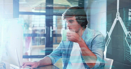 Working tech analyst monitoring data overlays on large monitor at office desk, with coffee mug