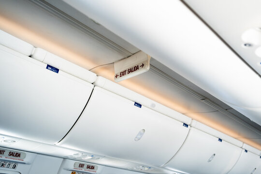 Overhead Storage and Exit Sign on Plane