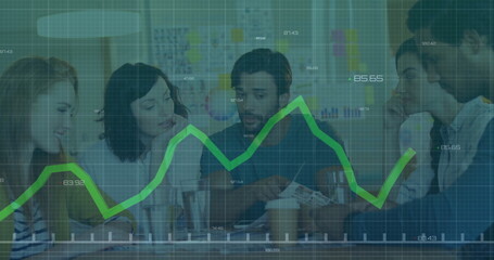 Five professionals wearing business casual working at office table, with charts and data overlay