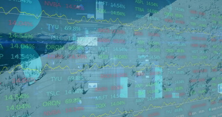 Displaying financial overlay covering snowy slope, with trend lines, pie chart and ticker symbols
