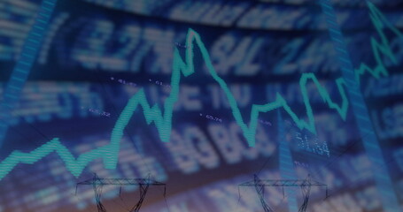 Displaying green fluctuating line chart with numeric ticker on screen and power tower silhouettes