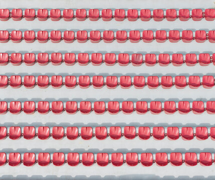 Aerial View of Uniformly Arranged Red Seats in Rows