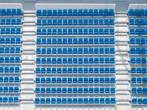Organized Stadium Seating with Blue Chairs
