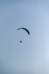 Man paragliding in the town of Organya in the province of Lleida in northern Spain in August 2025.