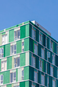 Modern Green Facade Apartment Building
