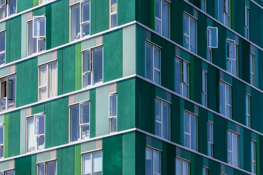 Modern Green Facade Apartment Building