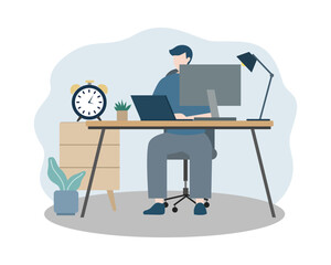 Businessman working on laptop at office desk.