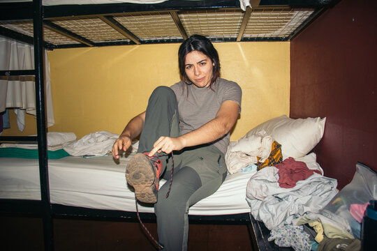 Unexpected photo of a Traveler getting ready in Hostel