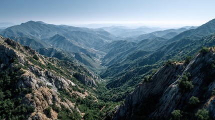 Naklejka premium Expansive mountain range with lush valleys.